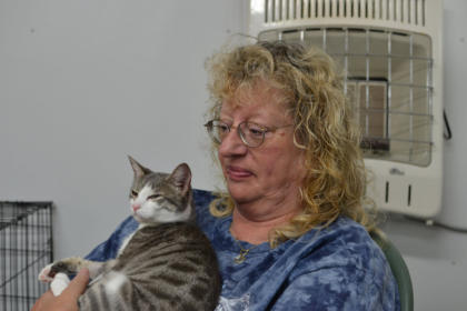 Nancy with Sasha,   Sasha is an interesting looking gray tabby with white